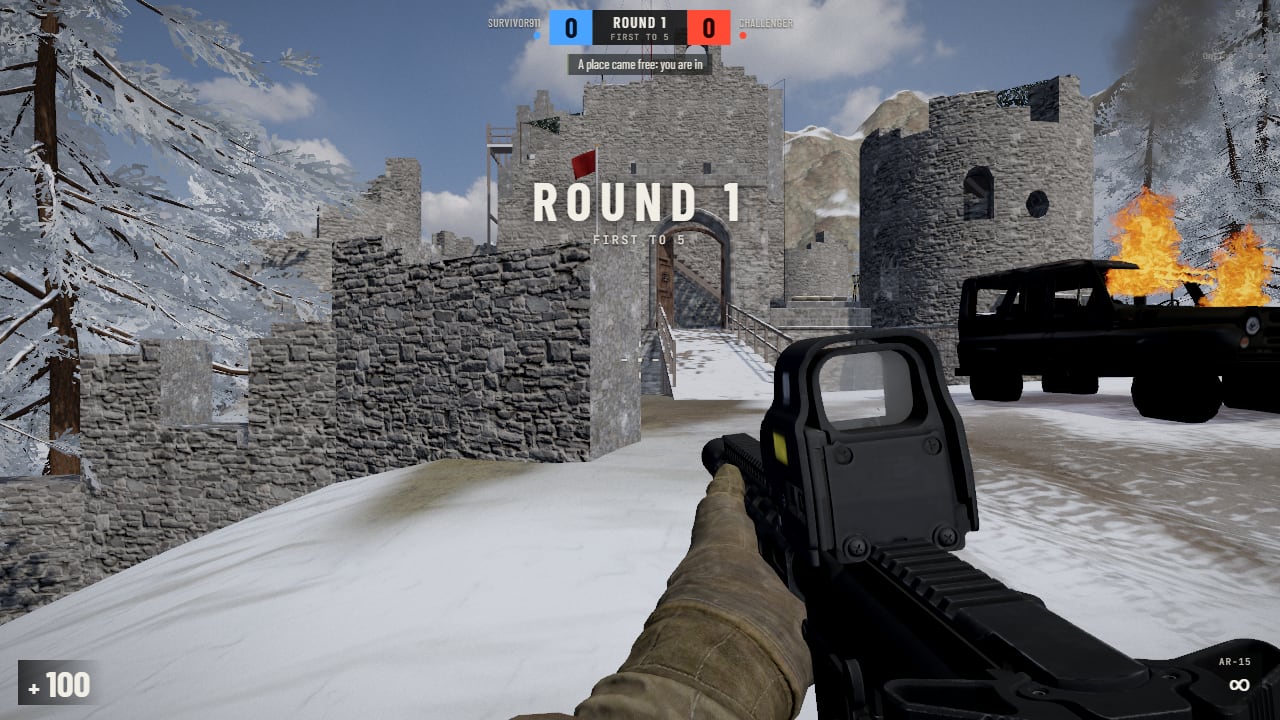 First person with an AR-15 and a red-dot sight before the fort's gate in snow, a jeep burning to the right; at the top a blue 0 and a red 0 either side of ROUND 1, FIRST TO 5, and ROUND 1 large in the middle; health 100 at the bottom left, AR-15 and an infinity sign at the bottom right