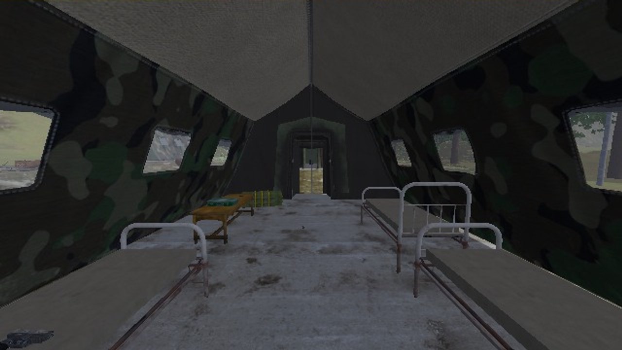 Inside an army tent: iron cots down both sides, a table, the doorway at the far end
