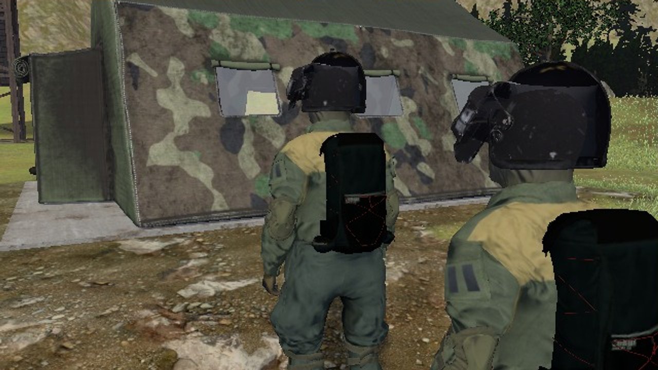 A small black pack on a survivor's back, seen from behind