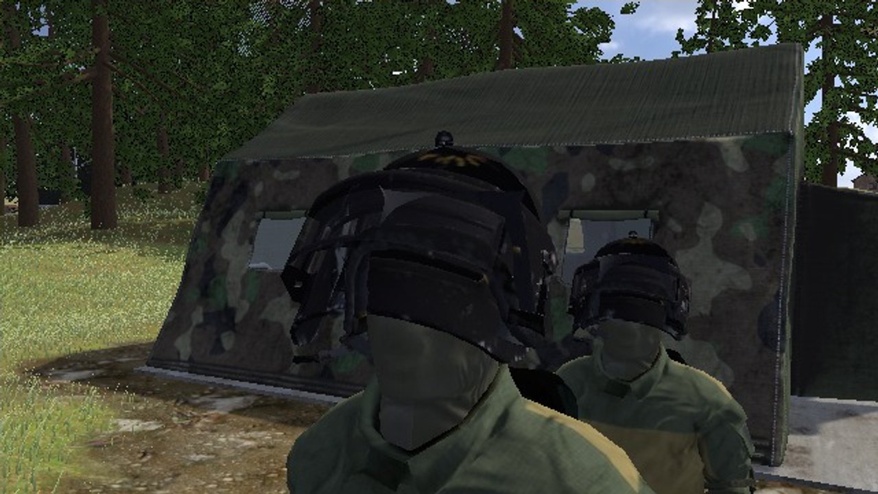 A black assault helmet with its steel visor raised, on a survivor's head