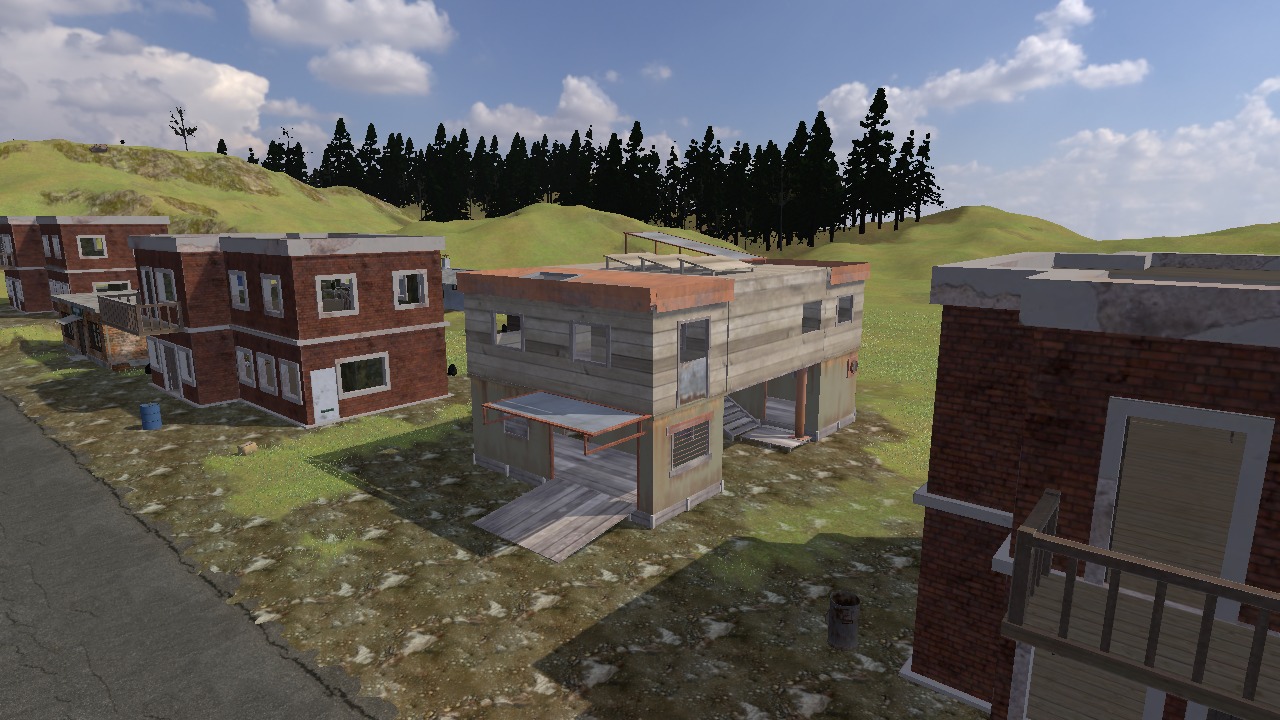 A plank house on piles between two brick houses