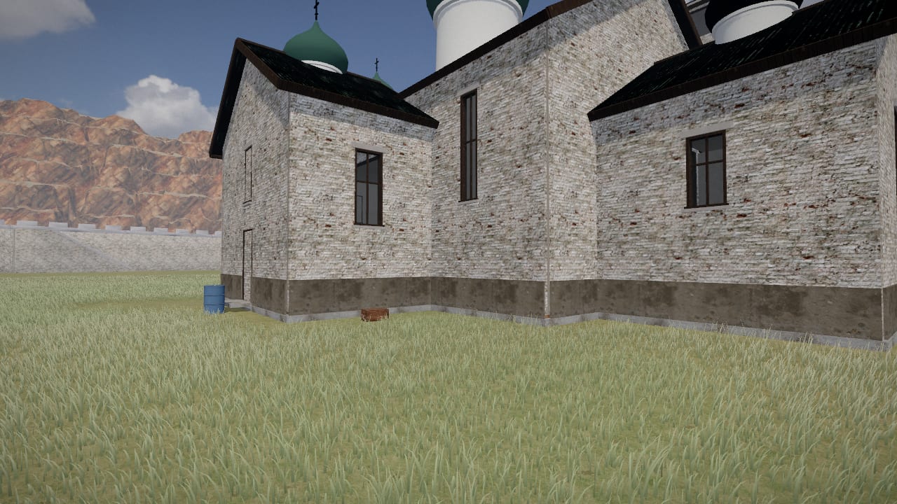 The cathedral at Pokrov: white stone walls, a green onion dome over its apse, its belfry behind