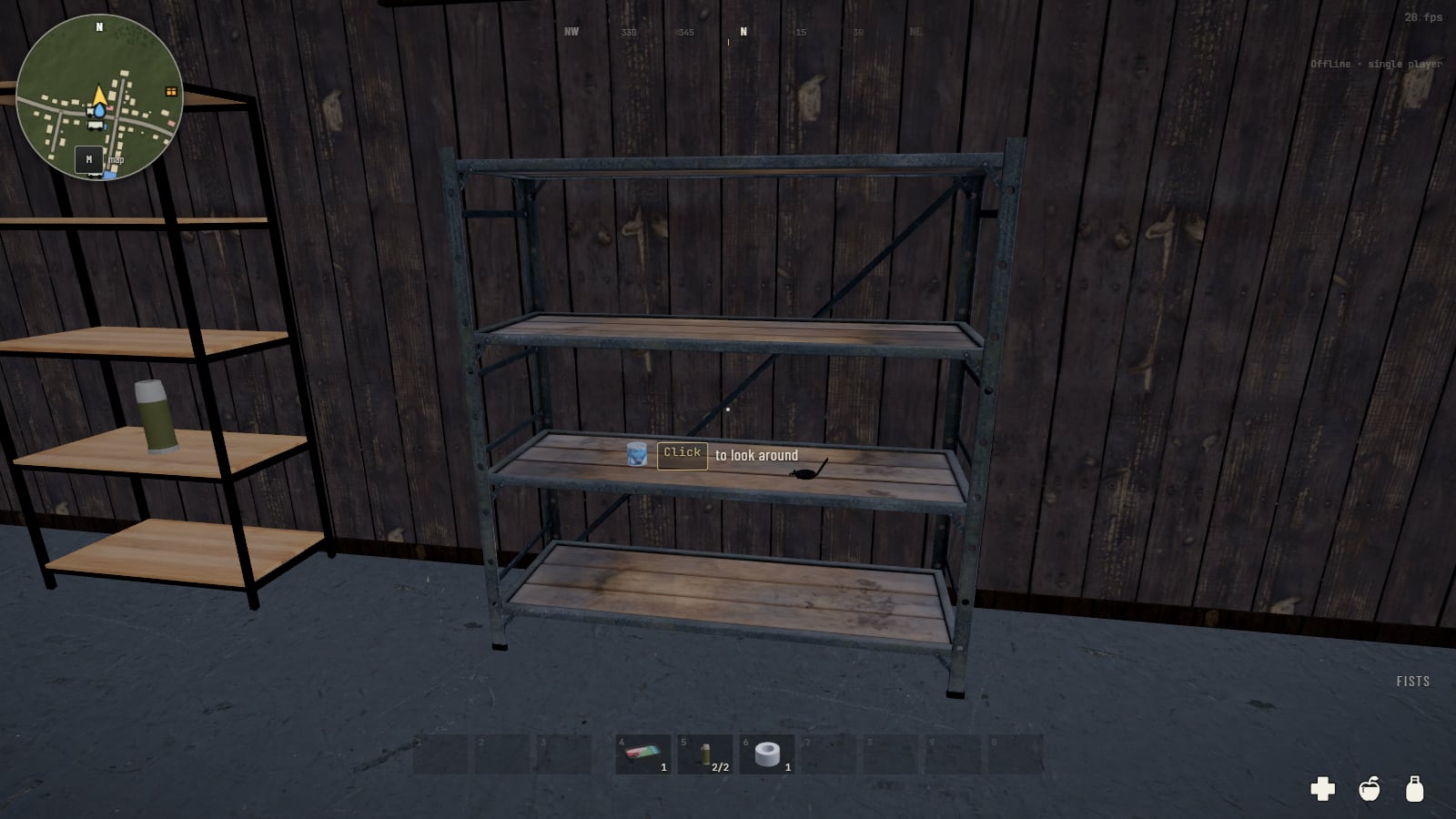 Inside a barn of dark boards: a steel rack with wooden shelves against the wall, a bottle on its middle shelf, and a lighter rack beside it with a tin on one of its boards