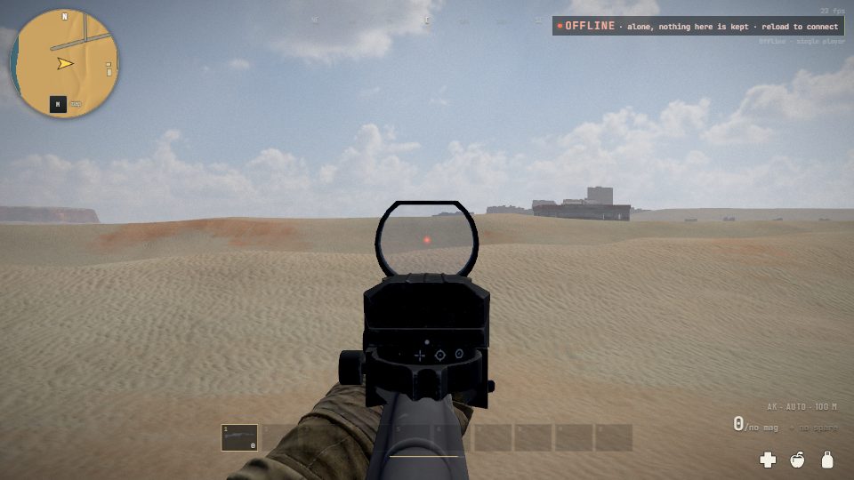 Aiming an AK through a red dot sight, a small red dot in the middle of its window over the desert
