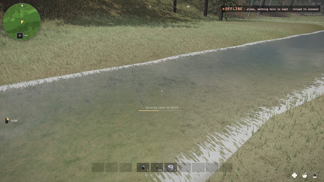 Standing at a river's edge with the bar for drinking from the river filling